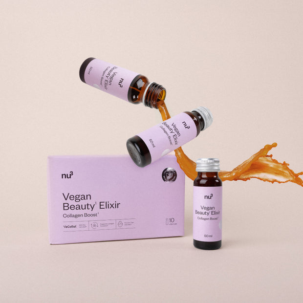 Verpackung und drei fläschchen und Flüssigleit von vegan collagen boost